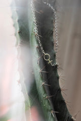 Minna armband i silver med kvinno/venus-symbol tillverkad i Stockholm.