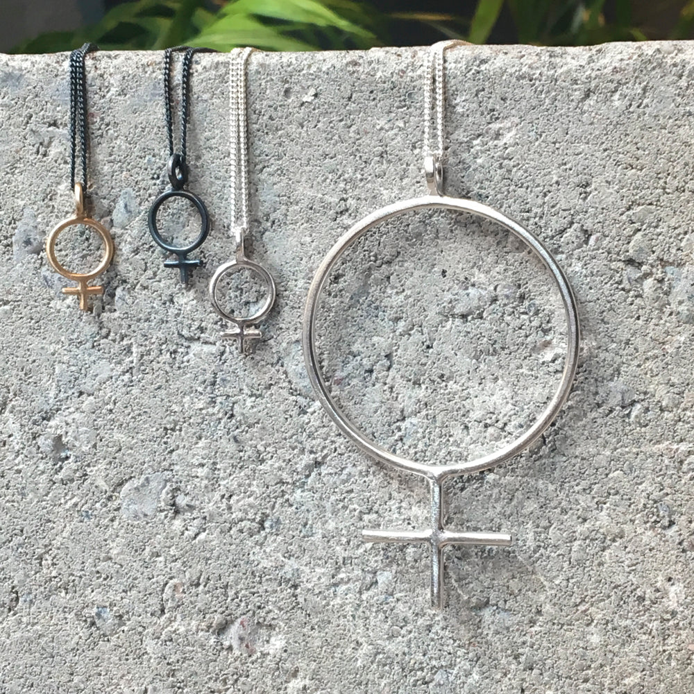 Feminist-halsband i återvunnet miljövänligt silver, direkt från vår verkstad på Södermalm, Stockholm.
